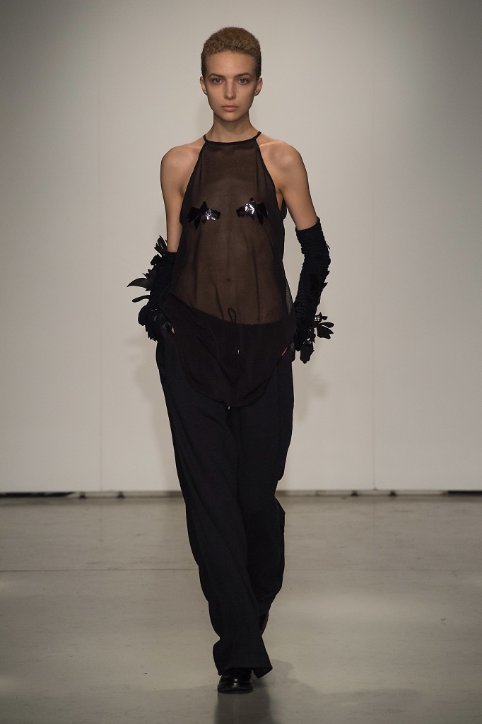 MILAN, ITALY - FEBRUARY 24: Designer Sergei Grinko acknowledges the audience at the end of the Grinko show during Milan Fashion Week Fall/Winter 2016/17 on February 24, 2016 in Milan, Italy. (Photo by Tullio M. Puglia/Getty Images for Grinko)